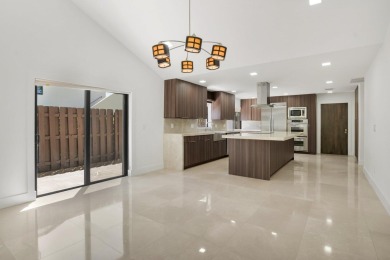 This remodeled two-story villa is a must-see. It's been on Boca Lago Golf and Country Club in Florida - for sale on GolfHomes.com, golf home, golf lot