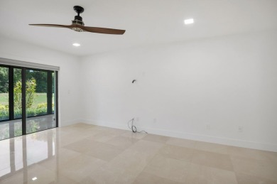 This remodeled two-story villa is a must-see. It's been on Boca Lago Golf and Country Club in Florida - for sale on GolfHomes.com, golf home, golf lot