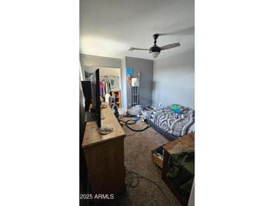 Investor special! Spacious 5-bedroom, 2.5-bath fixer-upper on Oasis Golf Club in Arizona - for sale on GolfHomes.com, golf home, golf lot
