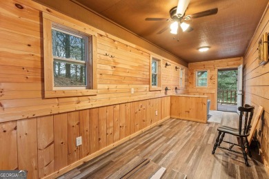 Escape to the beauty of the North Georgia mountains with this on Sky Valley Resort and Country Club in Georgia - for sale on GolfHomes.com, golf home, golf lot