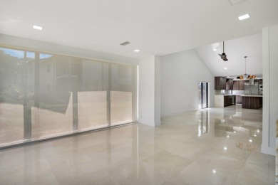 This remodeled two-story villa is a must-see. It's been on Boca Lago Golf and Country Club in Florida - for sale on GolfHomes.com, golf home, golf lot