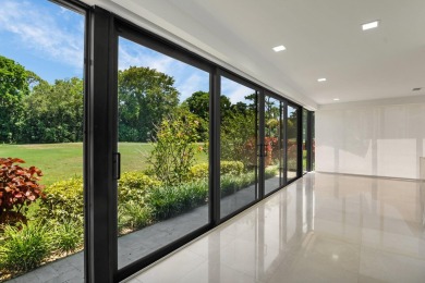 This remodeled two-story villa is a must-see. It's been on Boca Lago Golf and Country Club in Florida - for sale on GolfHomes.com, golf home, golf lot