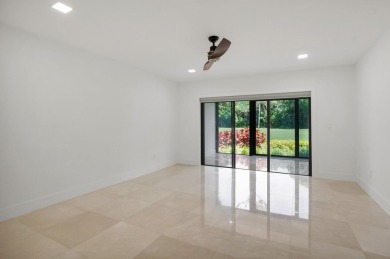 This remodeled two-story villa is a must-see. It's been on Boca Lago Golf and Country Club in Florida - for sale on GolfHomes.com, golf home, golf lot