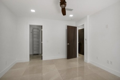 This remodeled two-story villa is a must-see. It's been on Boca Lago Golf and Country Club in Florida - for sale on GolfHomes.com, golf home, golf lot