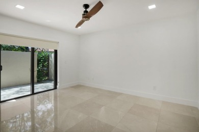 This remodeled two-story villa is a must-see. It's been on Boca Lago Golf and Country Club in Florida - for sale on GolfHomes.com, golf home, golf lot