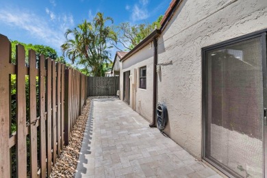 This remodeled two-story villa is a must-see. It's been on Boca Lago Golf and Country Club in Florida - for sale on GolfHomes.com, golf home, golf lot