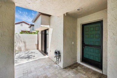 This remodeled two-story villa is a must-see. It's been on Boca Lago Golf and Country Club in Florida - for sale on GolfHomes.com, golf home, golf lot