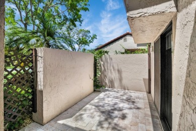 This remodeled two-story villa is a must-see. It's been on Boca Lago Golf and Country Club in Florida - for sale on GolfHomes.com, golf home, golf lot