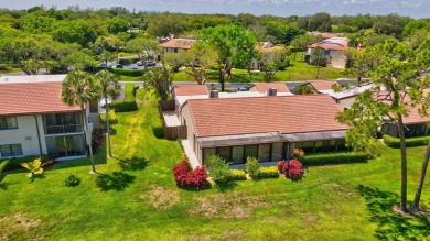 This remodeled two-story villa is a must-see. It's been on Boca Lago Golf and Country Club in Florida - for sale on GolfHomes.com, golf home, golf lot