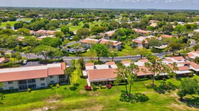 This remodeled two-story villa is a must-see. It's been on Boca Lago Golf and Country Club in Florida - for sale on GolfHomes.com, golf home, golf lot