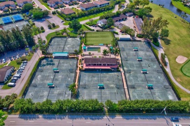 This remodeled two-story villa is a must-see. It's been on Boca Lago Golf and Country Club in Florida - for sale on GolfHomes.com, golf home, golf lot