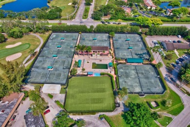 This remodeled two-story villa is a must-see. It's been on Boca Lago Golf and Country Club in Florida - for sale on GolfHomes.com, golf home, golf lot