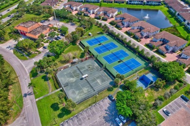 This remodeled two-story villa is a must-see. It's been on Boca Lago Golf and Country Club in Florida - for sale on GolfHomes.com, golf home, golf lot