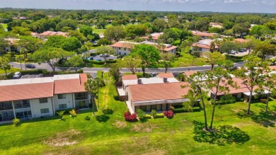 This remodeled two-story villa is a must-see. It's been on Boca Lago Golf and Country Club in Florida - for sale on GolfHomes.com, golf home, golf lot