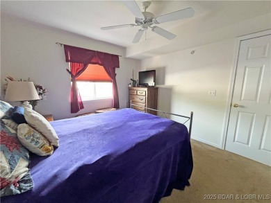 Come check out this spacious 3 bed, 2 bath lakefront condo at on Lake Valley Country Club in Missouri - for sale on GolfHomes.com, golf home, golf lot