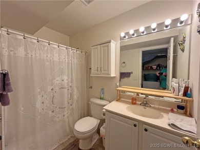 Come check out this spacious 3 bed, 2 bath lakefront condo at on Lake Valley Country Club in Missouri - for sale on GolfHomes.com, golf home, golf lot