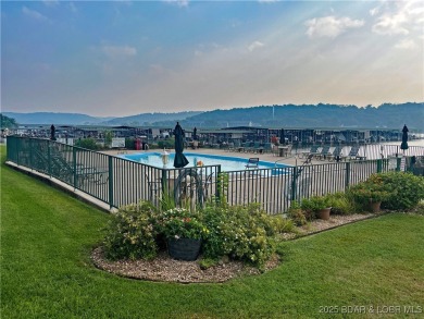 Come check out this spacious 3 bed, 2 bath lakefront condo at on Lake Valley Country Club in Missouri - for sale on GolfHomes.com, golf home, golf lot