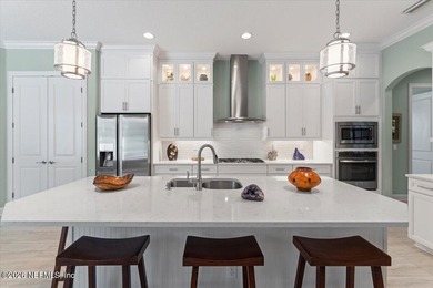 Stunning Riverside Coastal elevation home by Dostie Homes on The Palencia Club in Florida - for sale on GolfHomes.com, golf home, golf lot