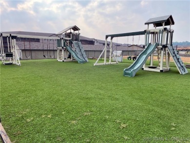 Come check out this spacious 3 bed, 2 bath lakefront condo at on Lake Valley Country Club in Missouri - for sale on GolfHomes.com, golf home, golf lot