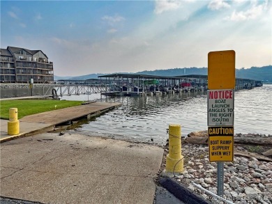 Come check out this spacious 3 bed, 2 bath lakefront condo at on Lake Valley Country Club in Missouri - for sale on GolfHomes.com, golf home, golf lot