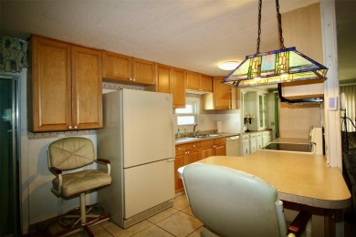 **ENORMOUS LIVING SPACE IN GOLDEN GATE** Enjoy one of the on Mainlands Golf Club in Florida - for sale on GolfHomes.com, golf home, golf lot