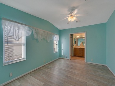 RARE OPPORTUNITY to own this gently used home on TWO LOTS on Barefoot Bay Golf Course in Florida - for sale on GolfHomes.com, golf home, golf lot