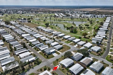 PRICE IMPROVEMENT: FLOWER Section/BAREFOOT BAY - CORNER LOT with on Barefoot Bay Golf Course in Florida - for sale on GolfHomes.com, golf home, golf lot