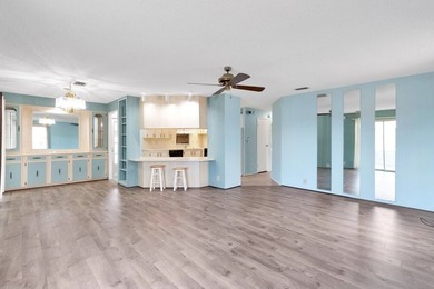 PRICE IMPROVEMENT: FLOWER Section/BAREFOOT BAY - CORNER LOT with on Barefoot Bay Golf Course in Florida - for sale on GolfHomes.com, golf home, golf lot