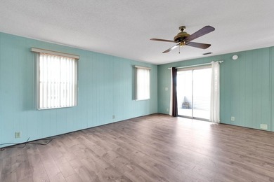 PRICE IMPROVEMENT: FLOWER Section/BAREFOOT BAY - CORNER LOT with on Barefoot Bay Golf Course in Florida - for sale on GolfHomes.com, golf home, golf lot