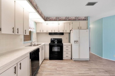 PRICE IMPROVEMENT: FLOWER Section/BAREFOOT BAY - CORNER LOT with on Barefoot Bay Golf Course in Florida - for sale on GolfHomes.com, golf home, golf lot