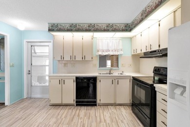 PRICE IMPROVEMENT: FLOWER Section/BAREFOOT BAY - CORNER LOT with on Barefoot Bay Golf Course in Florida - for sale on GolfHomes.com, golf home, golf lot