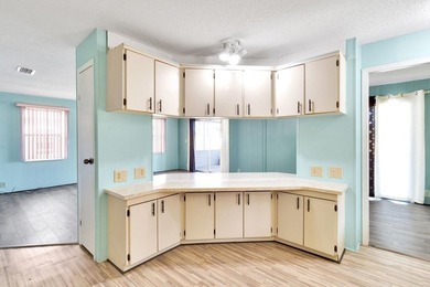 PRICE IMPROVEMENT: FLOWER Section/BAREFOOT BAY - CORNER LOT with on Barefoot Bay Golf Course in Florida - for sale on GolfHomes.com, golf home, golf lot