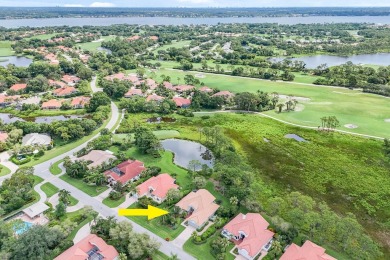 Nestled within the serene and exclusive Harbour Ridge Yacht & on Harbour Ridge Yacht and Country Club in Florida - for sale on GolfHomes.com, golf home, golf lot