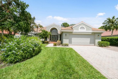 Nestled within the serene and exclusive Harbour Ridge Yacht & on Harbour Ridge Yacht and Country Club in Florida - for sale on GolfHomes.com, golf home, golf lot