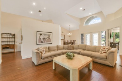 Nestled within the serene and exclusive Harbour Ridge Yacht & on Harbour Ridge Yacht and Country Club in Florida - for sale on GolfHomes.com, golf home, golf lot