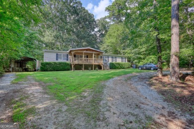 Charming 3-bedroom, 2-bath home in the desirable Turtle Cove on Turtle Cove Golf Course in Georgia - for sale on GolfHomes.com, golf home, golf lot