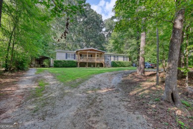 Charming 3-bedroom, 2-bath home in the desirable Turtle Cove on Turtle Cove Golf Course in Georgia - for sale on GolfHomes.com, golf home, golf lot