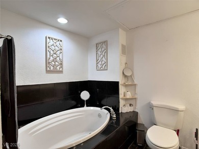 Wake up to lush green fairway views and the quiet elegance of on Las Vegas Country Club in Nevada - for sale on GolfHomes.com, golf home, golf lot