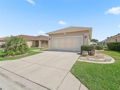Welcome to your new home in a truly gated community! This on Eagle Ridge At Spruce Creek Country Club in Florida - for sale on GolfHomes.com, golf home, golf lot