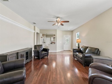 Welcome to your new home in a truly gated community! This on Eagle Ridge At Spruce Creek Country Club in Florida - for sale on GolfHomes.com, golf home, golf lot