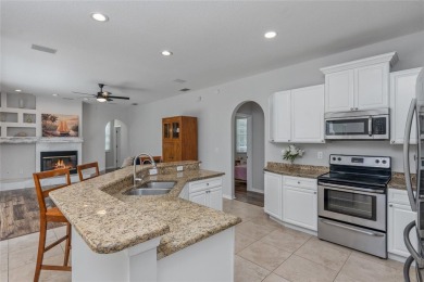 Stunning, Move-In Ready Pool Home on the Golf Course in The on The Eagles Golf Course and Club in Florida - for sale on GolfHomes.com, golf home, golf lot