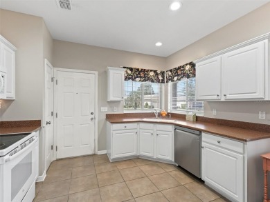 Welcome to your new home in a truly gated community! This on Eagle Ridge At Spruce Creek Country Club in Florida - for sale on GolfHomes.com, golf home, golf lot