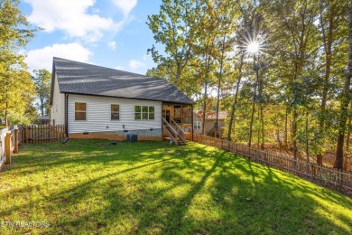 This stunning single-level home is full of modern touches and on Toqua Golf Course - Loudon County in Tennessee - for sale on GolfHomes.com, golf home, golf lot