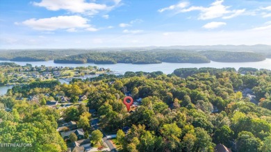 This stunning single-level home is full of modern touches and on Toqua Golf Course - Loudon County in Tennessee - for sale on GolfHomes.com, golf home, golf lot