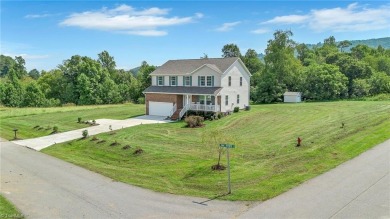 Like-new and truly move-in ready, this stunning 2-story on Oakwoods Country Club in North Carolina - for sale on GolfHomes.com, golf home, golf lot