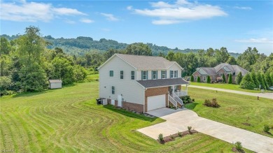 Like-new and truly move-in ready, this stunning 2-story on Oakwoods Country Club in North Carolina - for sale on GolfHomes.com, golf home, golf lot