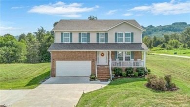 Like-new and truly move-in ready, this stunning 2-story on Oakwoods Country Club in North Carolina - for sale on GolfHomes.com, golf home, golf lot