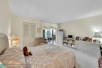 Desirable 2 bedroom, 2 bath unit in Deauville section of on Marina Lakes Golf Course in Florida - for sale on GolfHomes.com, golf home, golf lot