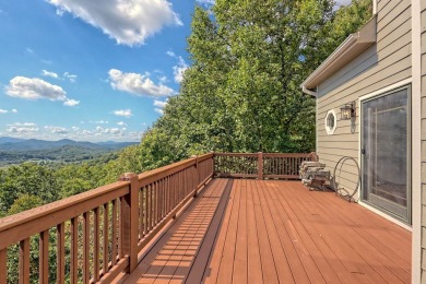 Indulge in breathtaking views from the moment you step foot in on Chatuge Shores Golf Course in North Carolina - for sale on GolfHomes.com, golf home, golf lot