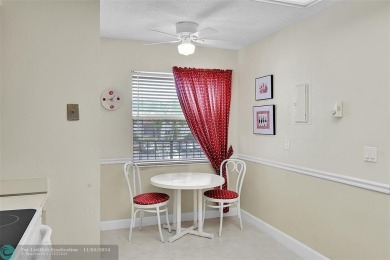 Desirable 2 bedroom, 2 bath unit in Deauville section of on Marina Lakes Golf Course in Florida - for sale on GolfHomes.com, golf home, golf lot